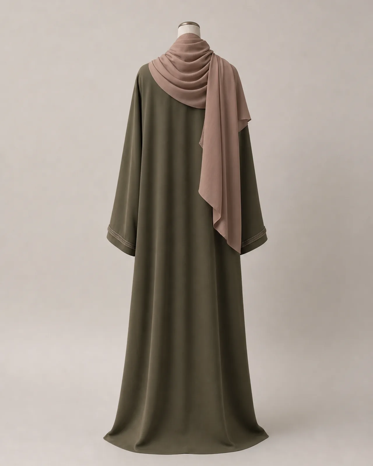 Back view of the styled hijab, showing how the fabric covers the back of the head and falls behind the shoulder