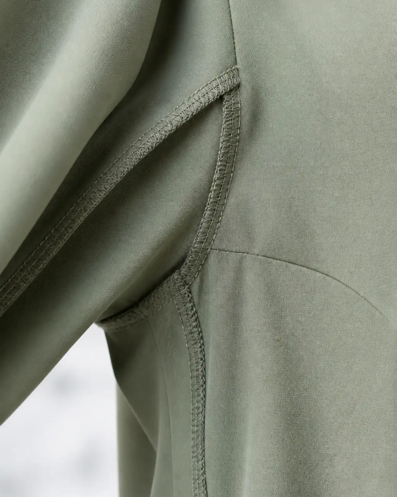 Side seam and underarm close-up, showing seam finish, seam allowance and sleeve set-in