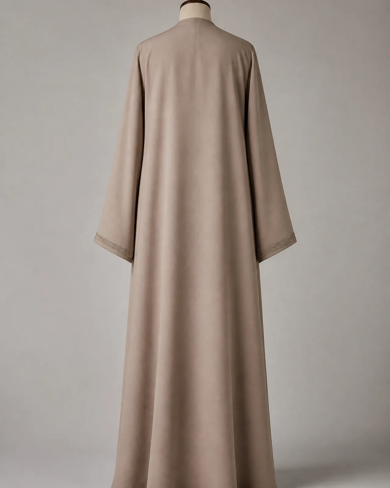 Back view, full length, showing whether the design carries embroidery on the back or leaves it plain
