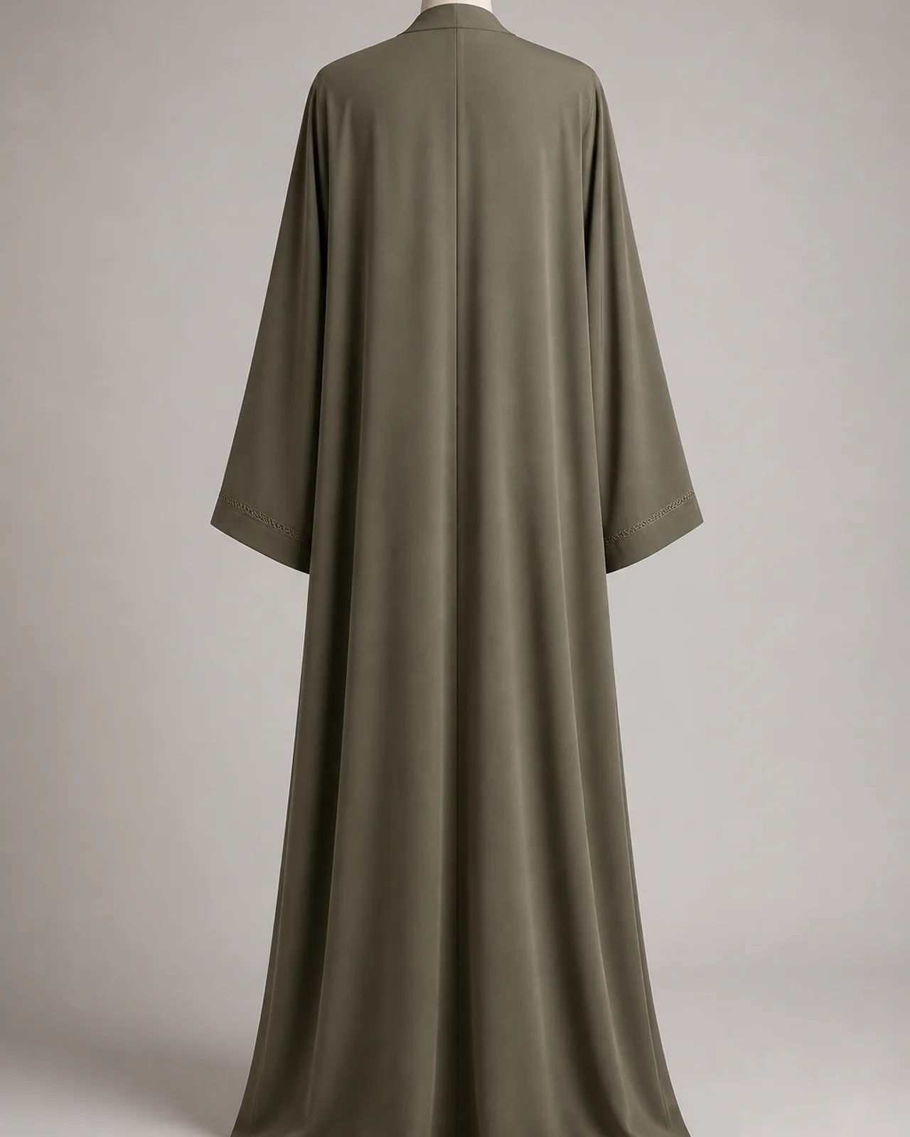 Side and back view of the same piece, showing how the shape closes at the back and how the fabric falls